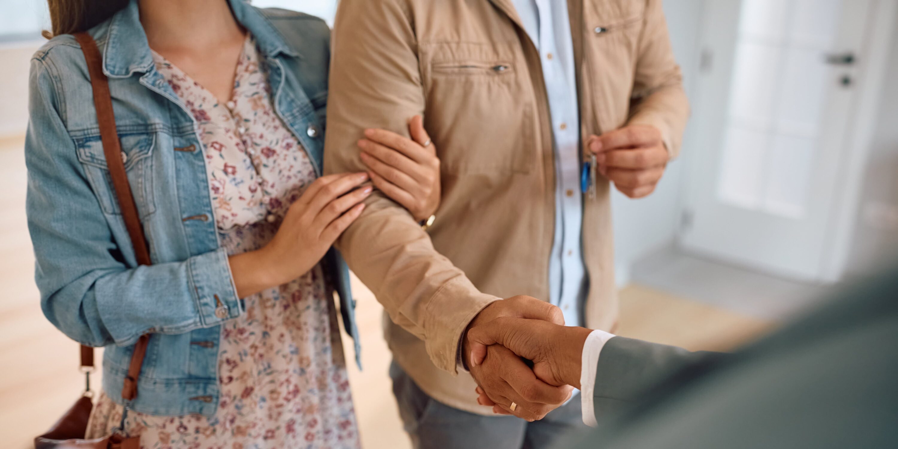 Couple shaking hands